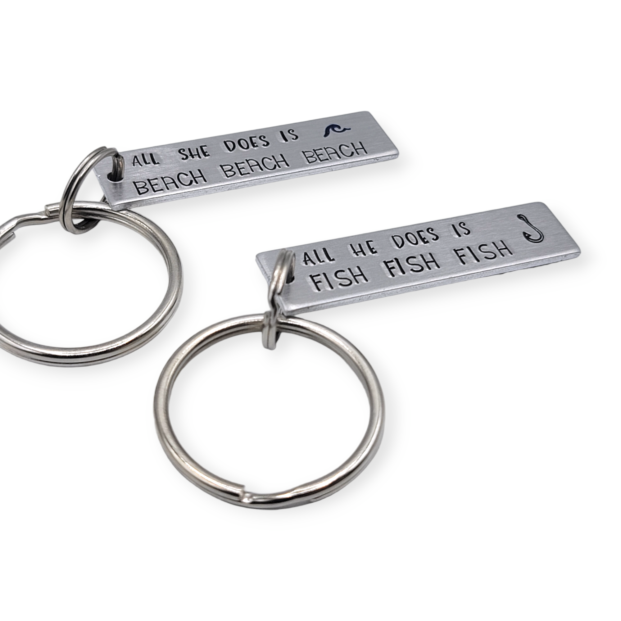 "All she does is beach, beach, beach" and "all he does is fish, fish, fish" SET ( 2 keychains) Hand Stamped Keychains - Travelers Trade Post