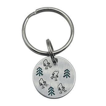 Bigfoot among the trees - Hand Stamped Keychain